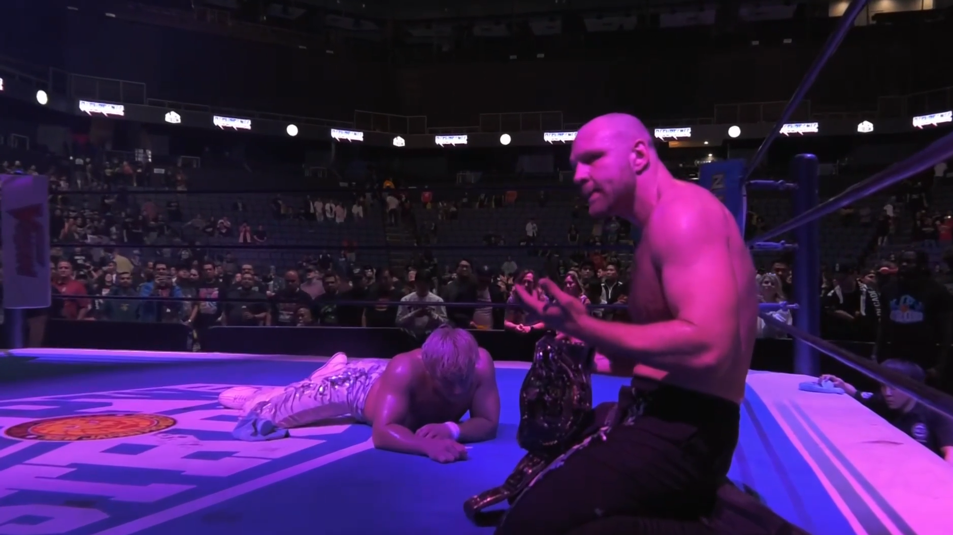 EVIL Attacks Jon Moxley, Defaces The IWGP World Title After Moxley's ...